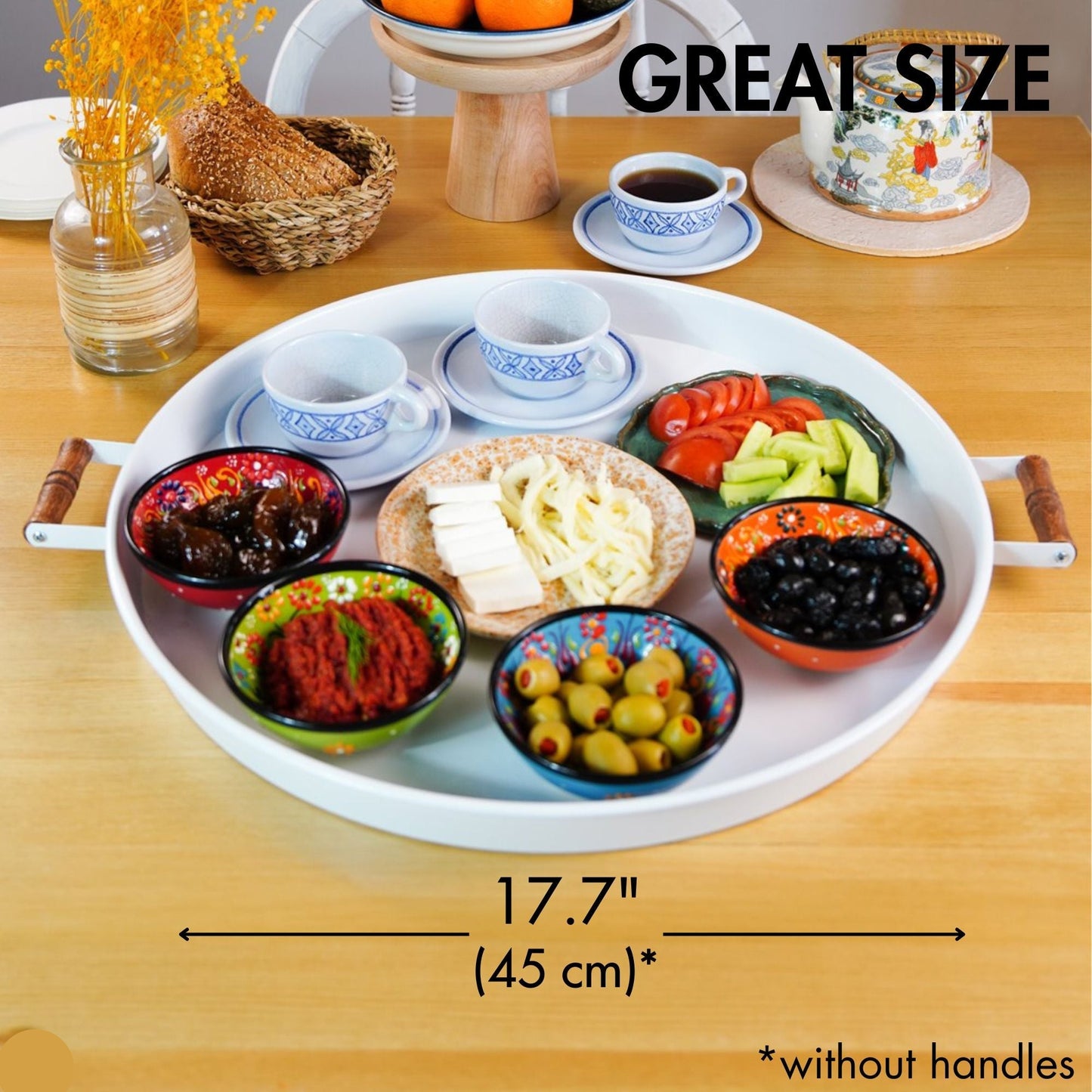 Round white tray with food items on a wooden table, labeled 'GREAT SIZE' and dimensions.