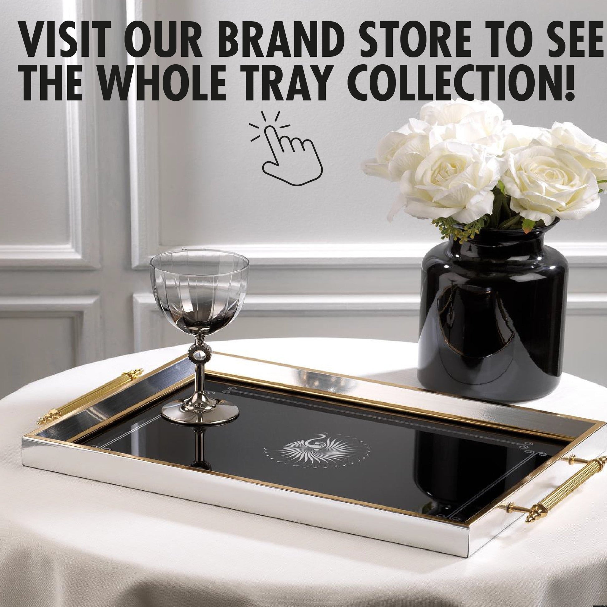 Decorative tray with a vase of white roses on a table, promoting a brand store.